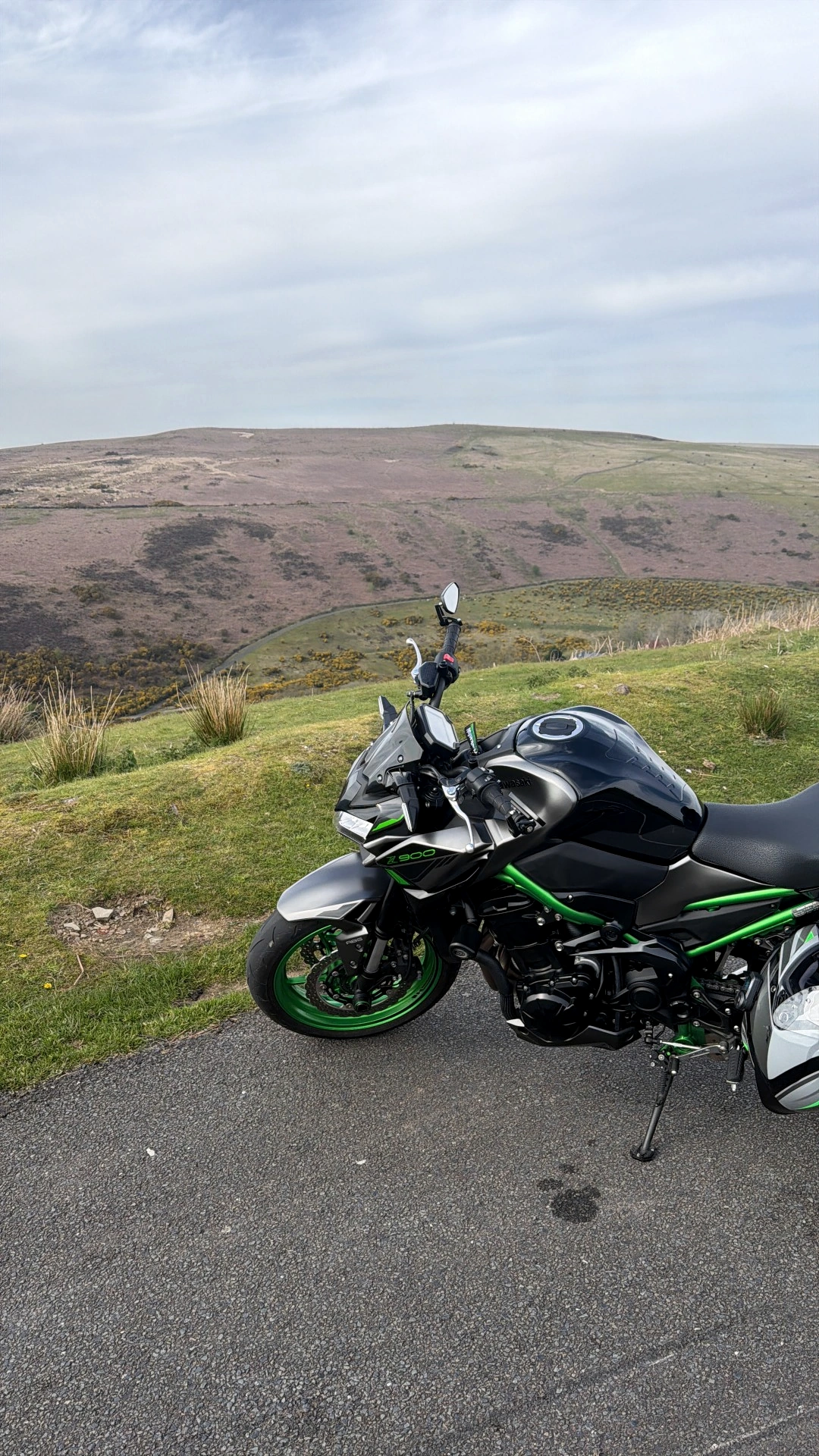 Kawasaki Z900 parked beside a Welsh mountain road
